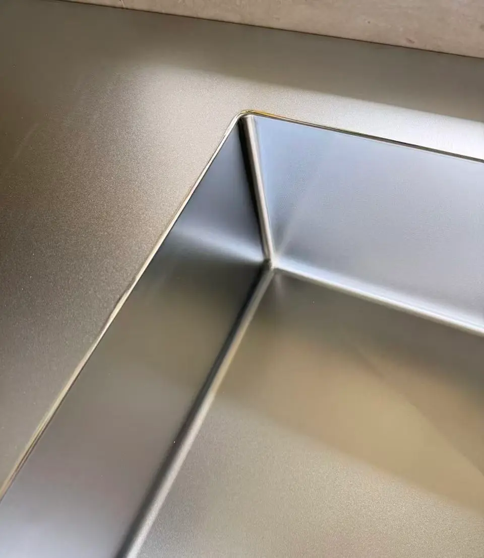 Stainless steel integrated sink closeup